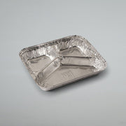 A rectangular aluminum foil compartment tray with three sections, shown on a neutral light gray background.