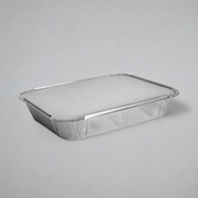 7x9 A rectangular aluminum foil tray with a crimped edge and a translucent lid, shown on a neutral gray background.