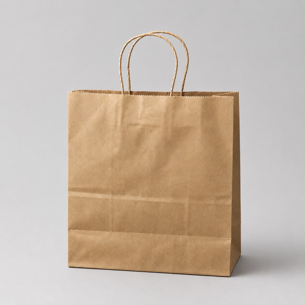 Box2Pack kraft paper takeaway bag with handles for restaurants, cafés and food delivery.