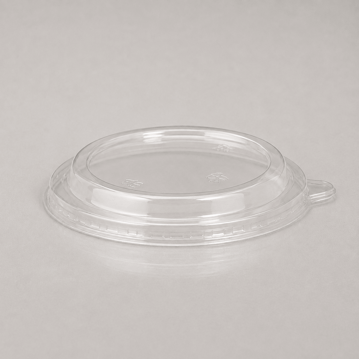 Clear snap-on lids for round kraft bowls and portion pots