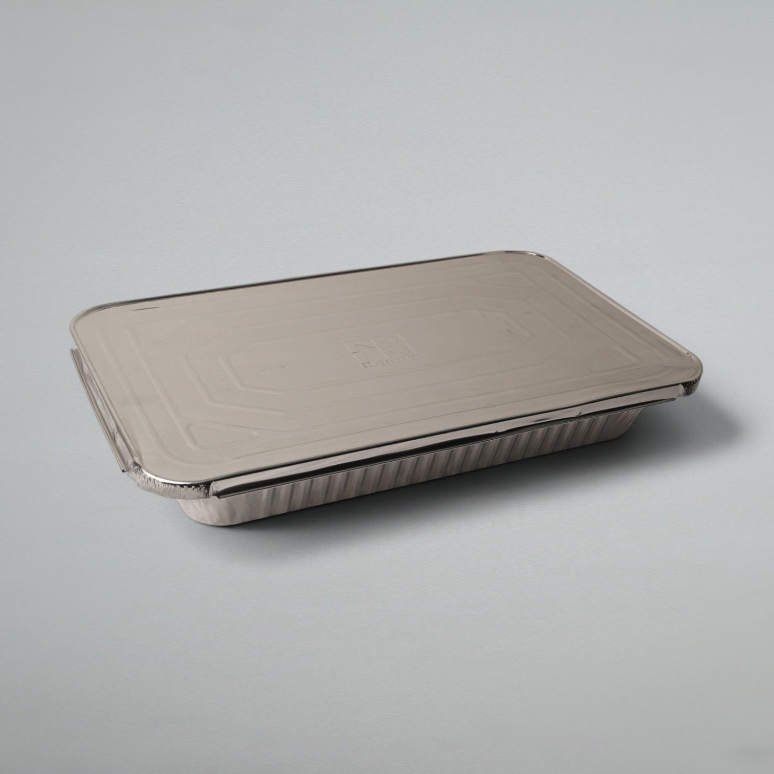 A rectangular disposable aluminum food tray with a matching fitted lid, photographed on a clean light gray studio background.