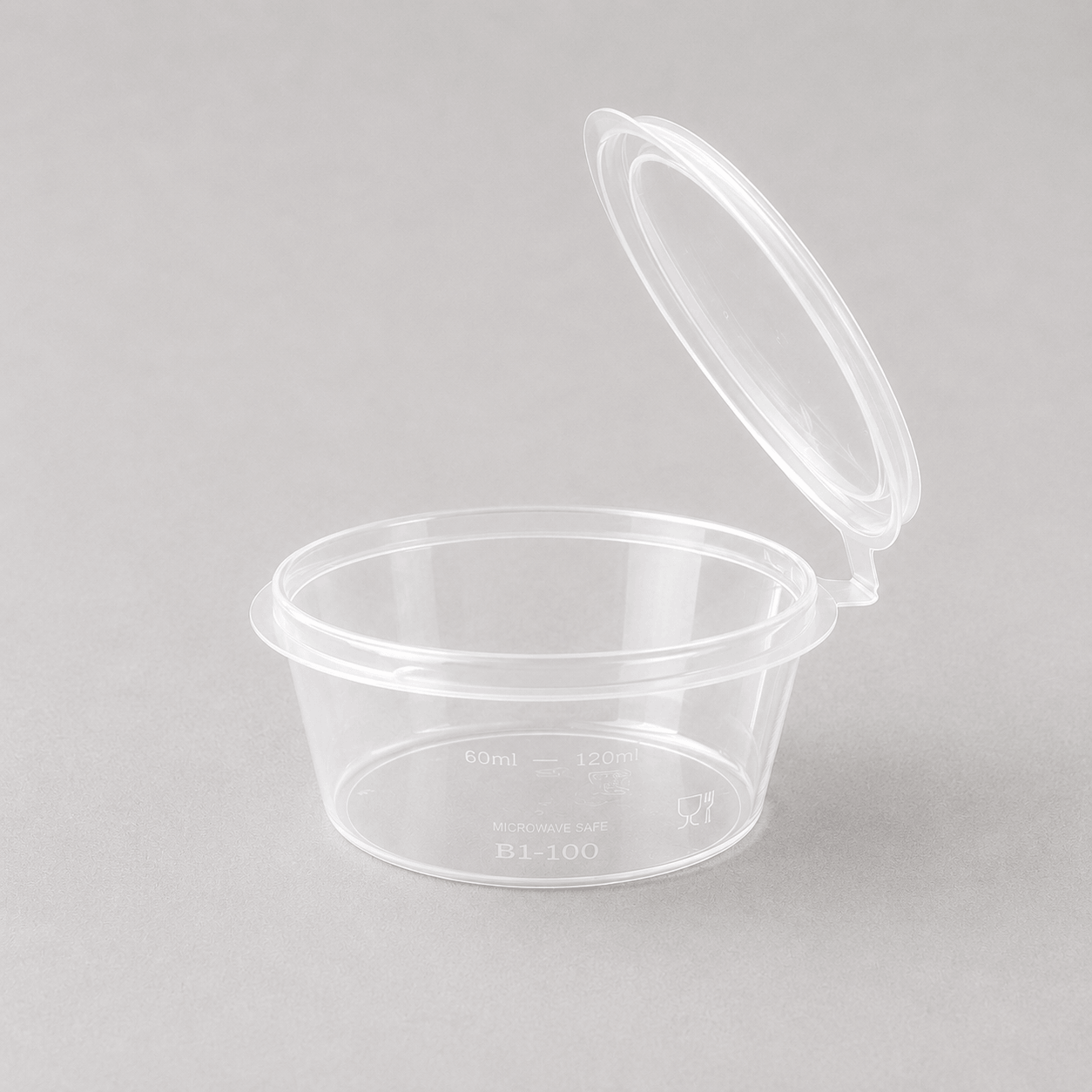 Hinged sauce container with lid open