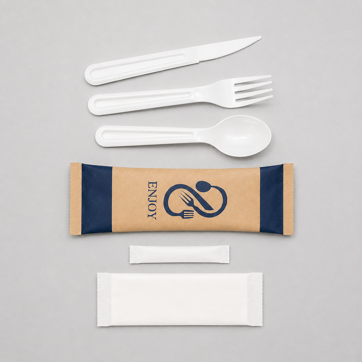 A flat-lay of a disposable plastic cutlery set