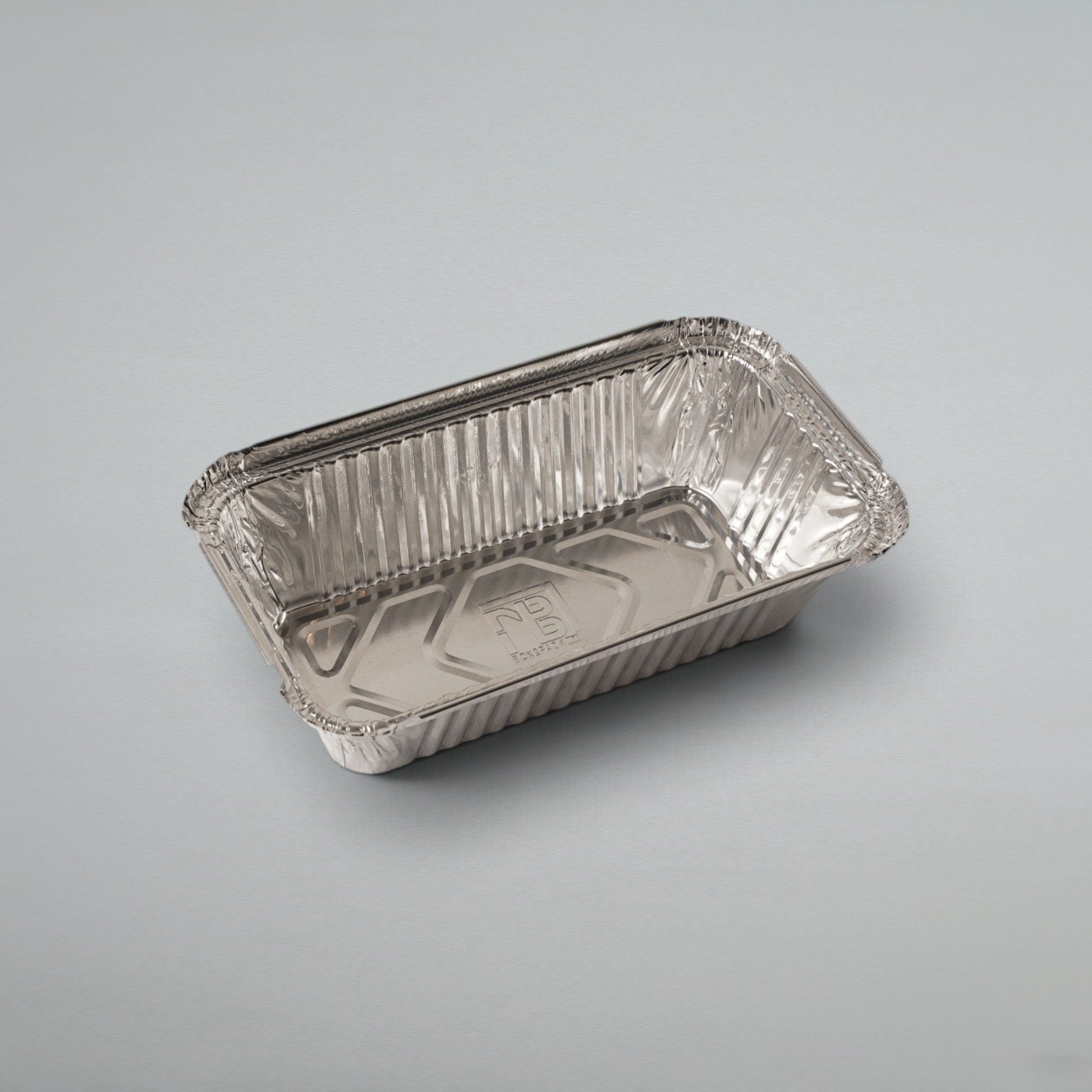 A rectangular aluminum foil tray with a crimped rim, shown on a neutral light gray background.