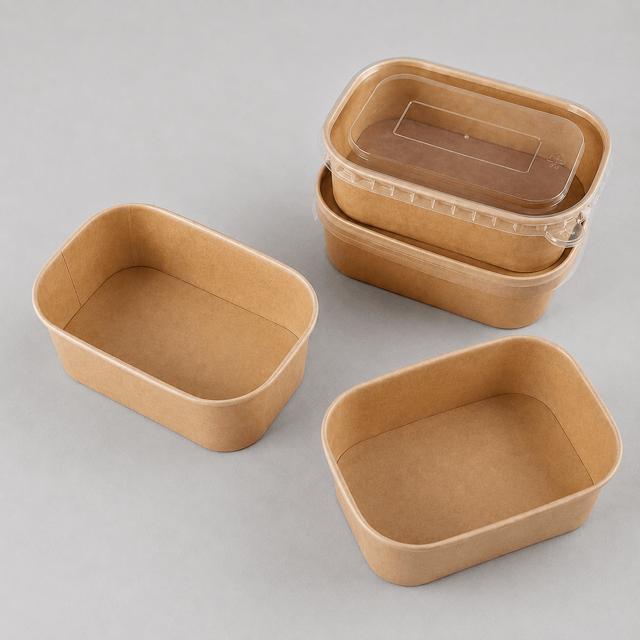 Rectangular kraft takeaway food containers with clear plastic lids in assorted sizes