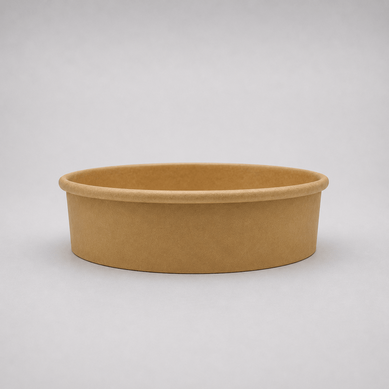 A single round kraft paper cup with a flat base, shown on a neutral light gray background.